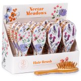 A stunning assortment of 2 bamboo hair brushes, each with a colourful floral and bee design.