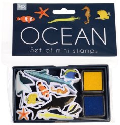 A set of ink pads and mini stamps of various shapes and sizes, each with a creature from the ocean.