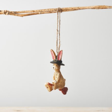 A charming and unique resin bunny sat on a broomstick with a witches hat. A beautifully detailed hanging decoration. 