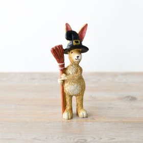 A standing rabbit decoration with a Halloween themed design including witches broom and hat! 