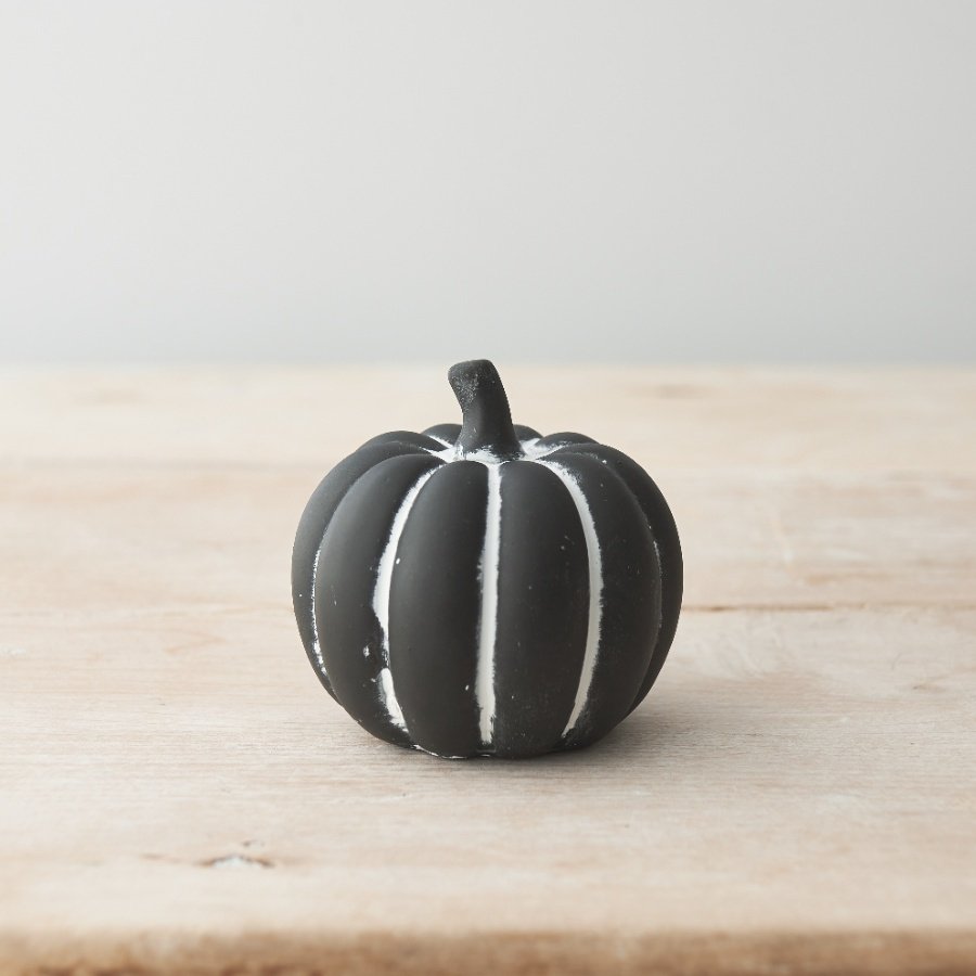 A stunning black and white hand painted pumpkin. Beautifully presented with a rustic finish. A must have item