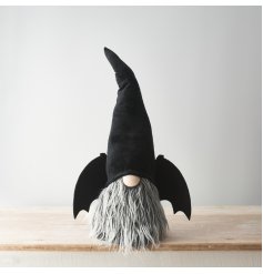 A unique large gonk decoration with a plush hat and bat wings. A must have decoration for the home this season. 