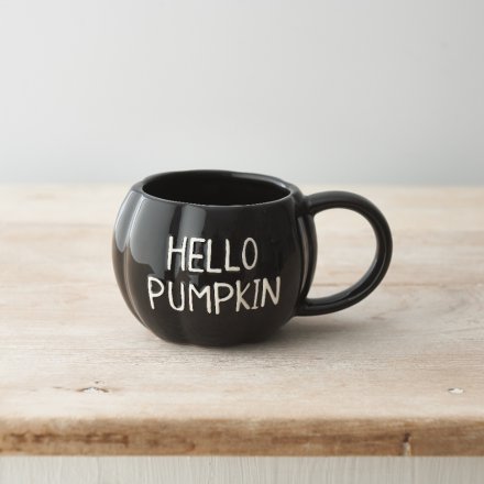 A unique pumpkin shaped mug in a black glossy finish. Complete with an embossed HELLO PUMPKIN slogan. 