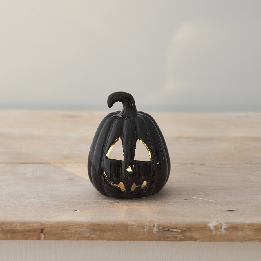 A charming black ceramic t-light holder. A spooky addition to the home this season.