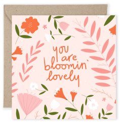 A pretty pink floral patterned card with the text "you are bloomin lovely".