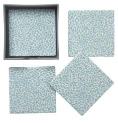A set of 4 matching coasters featuring an aqua coloured leaf print repeat pattern. 