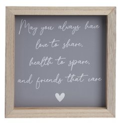 A simple and stylish box framed quote about love, health and friendship on a grey background. 
