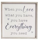 A simple and stylish boxed frame design with "when you love what you have, you have everything you need" quote. 