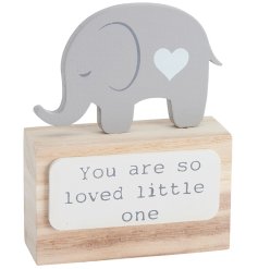 A wooden block with "you are so loved little one" plaque on the front and super cute elephant design with heart detail. 