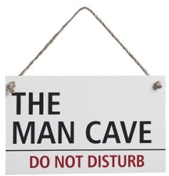 A decorative hanging sign in the style of a street sign, with bold "the man cave, do not disturb" text.