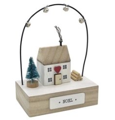 A charming wooden decoration with 3D home and heart decorations and a metal arch of bells. 