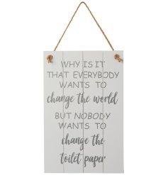 A decorative wooden sign with slatted design and humorous quote about changing toilet paper!