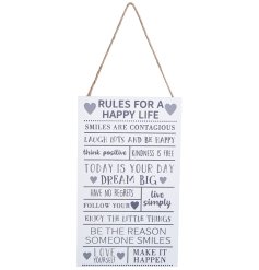 A decorative wooden sign with a quote containing the rules for a happy life! 