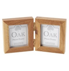 A classic folding twin photo frame with a beautiful chunky oak finish frame. 