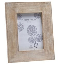 A classic wooden photo frame with space for a 5 x7 inch photo. 