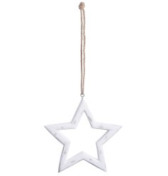 A antique whitewashed hanging star decoration. 