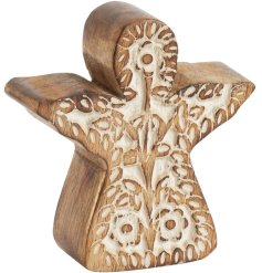 A hand-carved wooden angel with intricately carved detail.