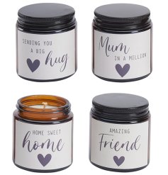 An assortment of 4 candles each presented in a lidded jar with sweet message and heart detail. 