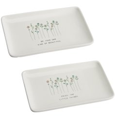 An assortment of 2 pretty trinket trays, each with a delicate wildflower illustration and uplifting message. 