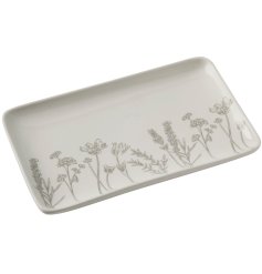 A small tray perfect for housing trinkets, with a delicate wildflower meadow illustration. 