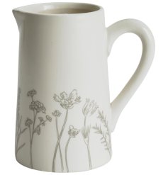 A beautiful jug shaped vase with pretty wildflower meadow illustration.