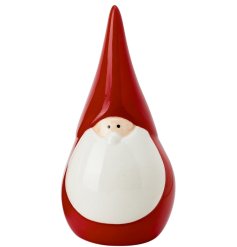 A cute small ceramic Santa with pointed hat and cute painted face.