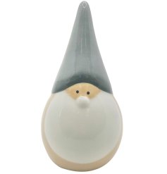 A fawn coloured Santa decoration with pointed hat design.