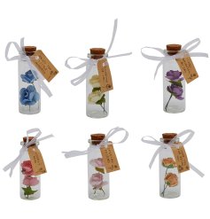 An assortment of 24 miniature bottles, each containing two unique artificial flowers. Complete with a charming slogan 