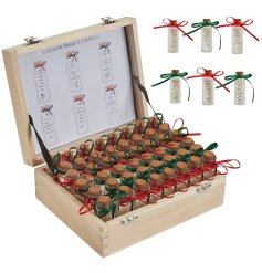 A classic wooden chest filled with an assortment of miniature bottles, each containing a lovely Christmas message. 