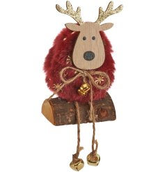 An adorable little reindeer with a fluffy pom pom body and decorative gold antlers and details and twine bow. 