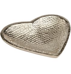 A stunning textured silver metal heart shaped dish.