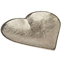 A stunning large textured silver metal heart shaped dish.