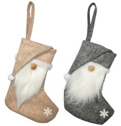 An assortment of 2 varying coloured Christmas stockings with snowflake detail.