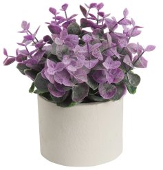 A beautiful artificial plant in a stylish pot.