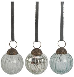 Three assorted glass baubles with cracked glass effect.