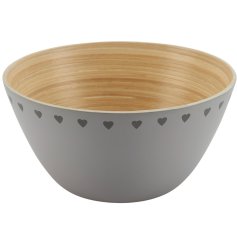 A lovely bamboo salad bowl with a grey finish and dark grey heart pattern around the edge. 