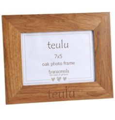 A Beautifully natural oak photo frame engraved with 'Teula' which is Family in Welsh.