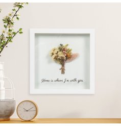 A beautiful box framed hanging sign with a dried flower bouquet display and "home is where I'm with you" message. 