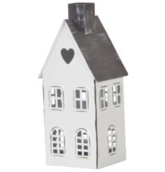 A distressed metal lantern house with a grey and white colour scheme and cut out details including heart motif. 
