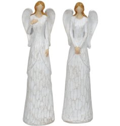 An assortment of 2 angel figures, each with carved detail dress and wings. 