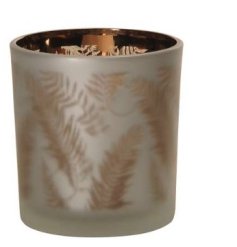 A glass tea light holder with a bonze metallic leaf design inside a frosted glass outer layer. 