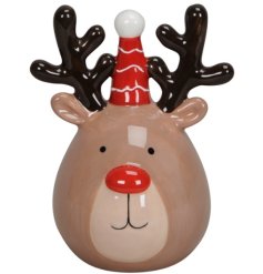 A freestanding reindeer ornament featuring a red nosed design with striped bobble hat.