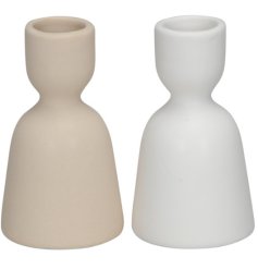 An assortment of 2 candle holders, each made from porcelain with a simple and contemporary design. 
