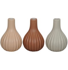 3 Assorted vases, each made from dolomite and with a ribbed 3d design in a tall teardrop shape. 