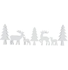 A set of 7 wooden freestanding decorations depicting a winter wonderland scene containing Christmas trees and stag/deers