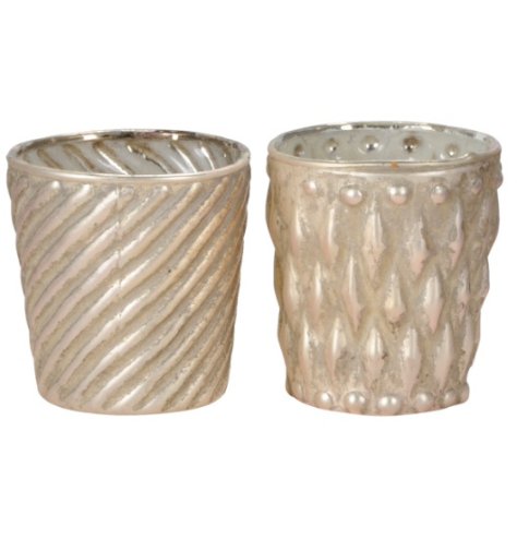 An assortment of 2 glass tea light holders with a sprayed gold finish and textured pattern design. 