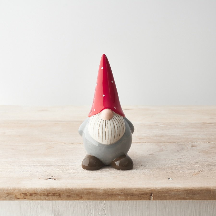 A charming gonk ornament with a detailed beard and dotty red hat. 