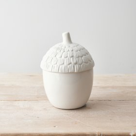 A chic acorn shaped container with a beautifully detailed lid. 