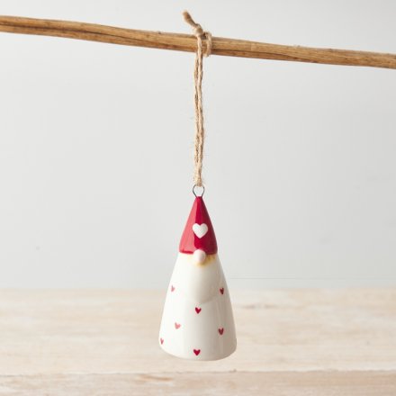 A unique ceramic gonk decoration with a dainty red heart design and rustic jute string hanger.