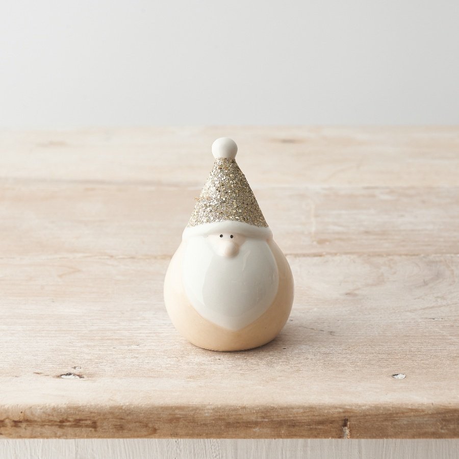 A chic gonk ornament with a sprinkling of festive sparkle with a gold glitter hat. 